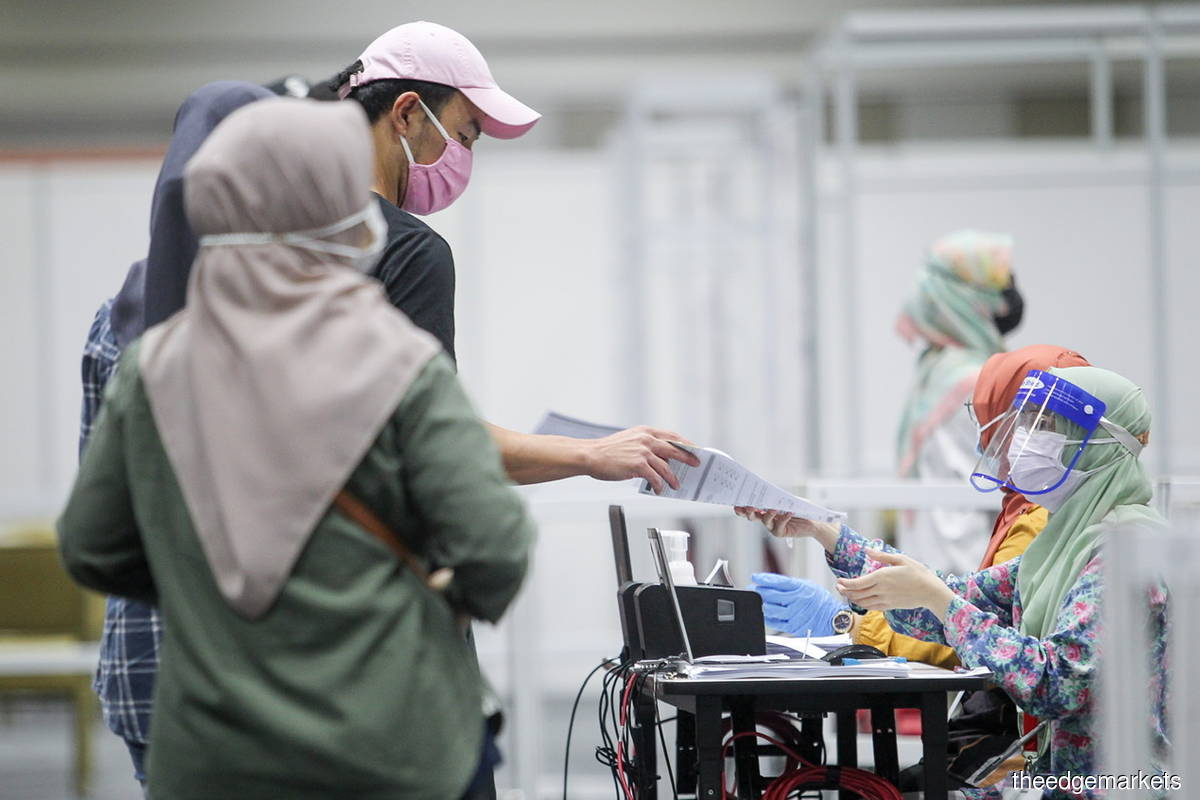 A total of 6.37 million people or 75.7% of the Klang Valley's population were fully vaccinated against Covid-19 as of yesterday (Sept 13). (Photo by Mohamad Shahril Basri/The Edge)